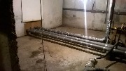 Теплоизоляция трубопровода систем отопления, горячего и холодного водоснабжения материалом "Энергофлекс" в подвале д. № 15